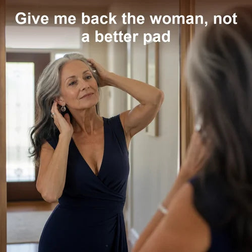 Give me back the woman, not a better pad: a woman of 60 in a fitted dress at her hallway mirror